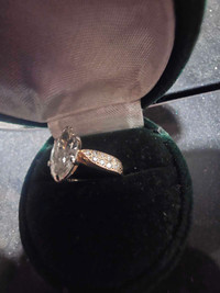 One stamped 14-18kt yellow gold 1.15 CT marquise shaped diamond