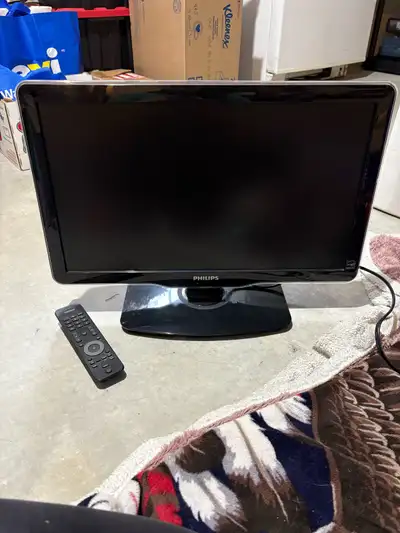 Philips flat-screen TV, 21 inches. In good working condition — clear picture and sound Comes with a...