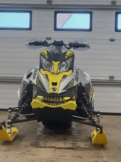 XRS with adjustable bar riser, belly pan protector, trail can, handguards lights. all shocks were do...