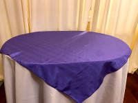 Purple tablecloths, napkins, table runners, curtains etc