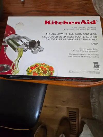 Spiralizer attachment for Kitchen Aid stand mixer. All pieces are there. Rarely used