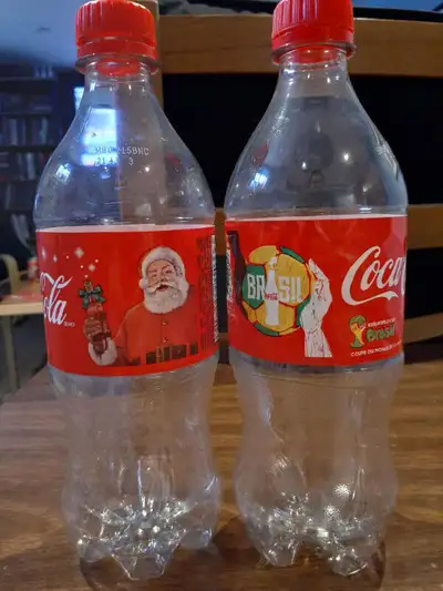 Coca Cola bottles -  plastic, View more