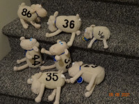 Collection of Sealy mattress sheep, different numbers,