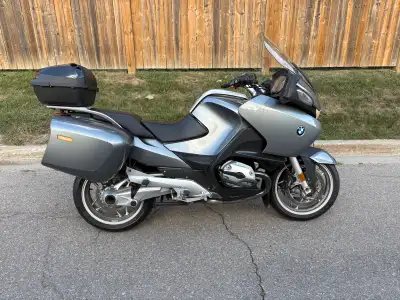In at BMW Motorad for New Michelin tires, safety,oil change differential oil change ,new fuel gauge...