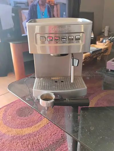 Brew the perfect espresso with this Cuisinart Espresso Machine, featuring a stainless steel housing...