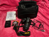 Nikon D5100 DSLR Camera w/ Lens