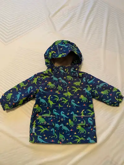 Jan & Jul dinosaur rain jacket size 1T (same as 12-18 months). Fleece lined. Excellent condition. Tw...