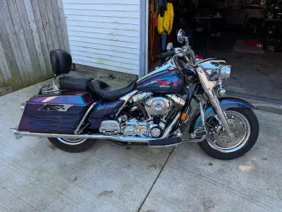 Selling my 2004 Road King. Bike is in amazing condition. Numbered paint job 63 of 100 for that year....