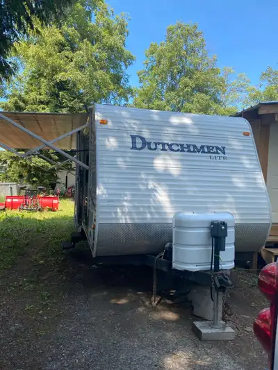 2010 Dutchman Lite travel trailer. 29 feet long. Sleeps 10. One owner. Well maintained. Has a half s...