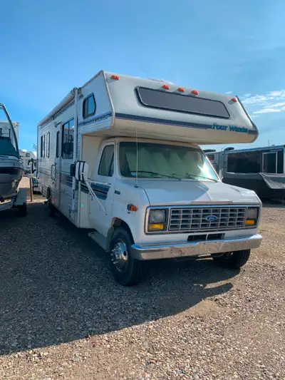 Renovated Class C Motorhome, new floor, carpet in cab, dinette cushions and table, new counter and f...