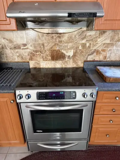KitchenAid electric slide in range and pacific range hood, View more