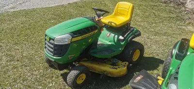 Selling craftsman riding lawn mower 54-in cut three blades 31 hours 23 hp John Deere d140 22 hp with...