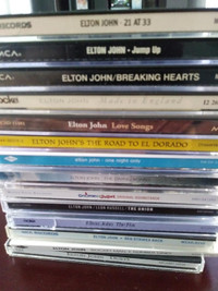 CDs for sale -- Demi Lovato, Adele, Elton John