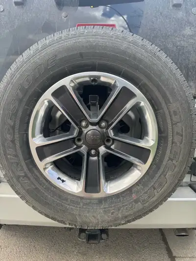 Used 5 oem 18” wheels and tires for Jeep Wrangler JL/JK Wheels are 5x127mm 18” and tires are 275/65R...
