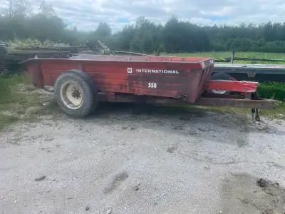 International 550 Manure Spreader in good working condition, $2100 or possibly trade for hay