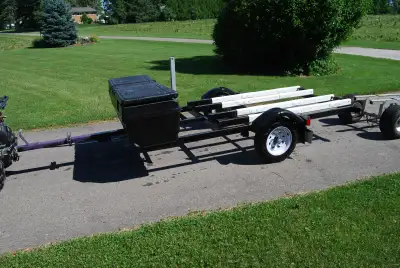 Home built trailer compatible for 2 stand up Jet Skis with cargo box and beach dolly. Asking $850 fi...