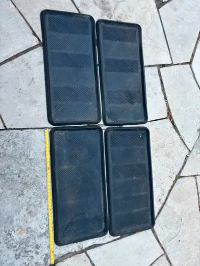 Heavy duty rubber mats; excellent condition; 89 X 43 cm; outer border perimeter is 3 cm tall; all bl...