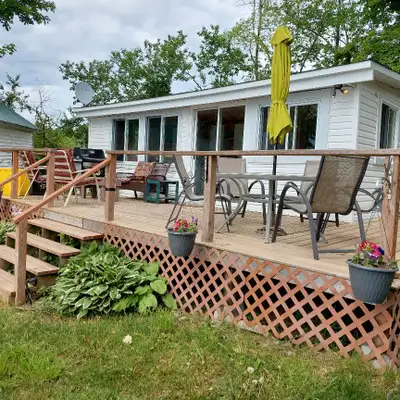 Mississippi Lake Cottage Rental on Robertson's Shore $1750/week Week runs Sat 3:00 p.m. - Sat. 11:00...