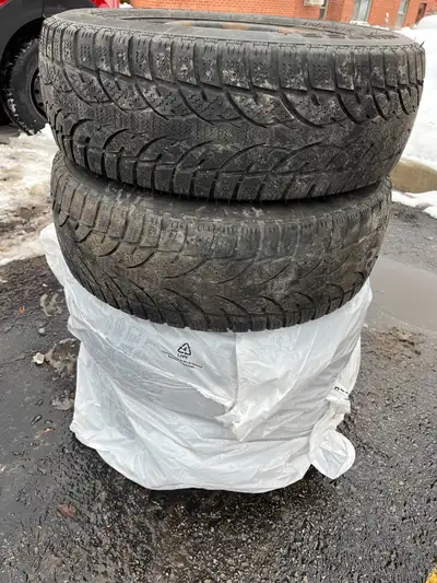 Eskay winter tires on rims 215/65/R16 5x114.3mm bolt pattern (5x4.5 inch) Used for a season, don't f...