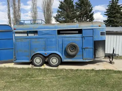 Solid older 4-horse straight load trailer — does the job without the premium price tag. 4-horse stra...