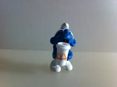 Smurfs - Vintage Smurf Holding a McDonald's Cup, View more