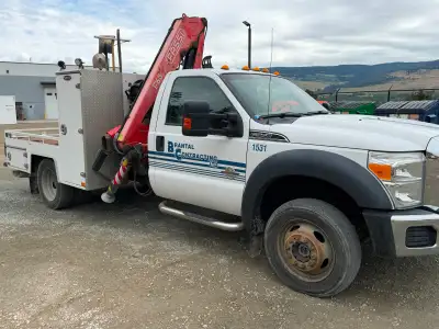 Perfect versatile truck! 2015 Ford F-550 regular cab with a Brutus deck and Fassi F65 crane. One own...