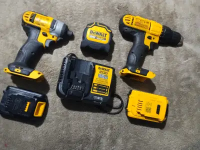 2 DeWalt drills, 2 batteries,charger and measuring tape $250 obo, View more