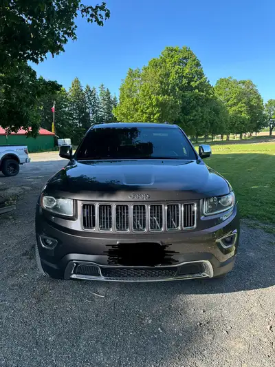 Looking to sell my 2014 Jeep grand cherokee LIMITED 5.7L Hemi. Has 181,000km on it mint shape works...