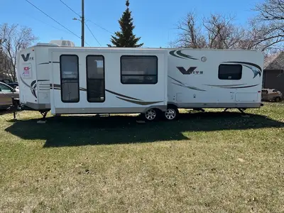 The flagstaff couple's RV is in beautiful condition. Just reduced from $20.000 to $ 18.000. Air cond...