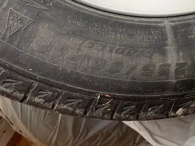 235/60R18 set of Michelin snow tires (X-Ice I think) on aluminum rims. This was the 2020 Volvo XC60...