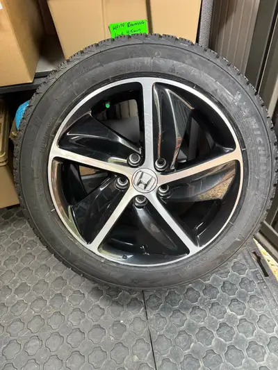 Offering 4 brand new Michelin X-Ice winter tires. 215 55R17 Mounted on factory aluminum Honda rims,...