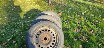 Rims and snow tires 225 65r 17, uniroyal tiger paws Good for one more season Rims are usable. Came o...