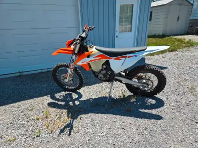 2020 XCF 250 With 65 hours. Bought it new in Jun of 2020 . Add an electric fan and skid plat . Not i...