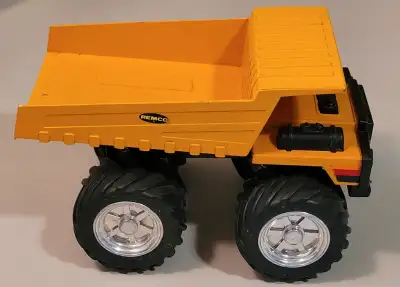 Vintage 1988 Remco Steel Metal Yellow Toy Dump Truck - 7 1/2 inches length x 4 1/2 inches wide x 4 1...