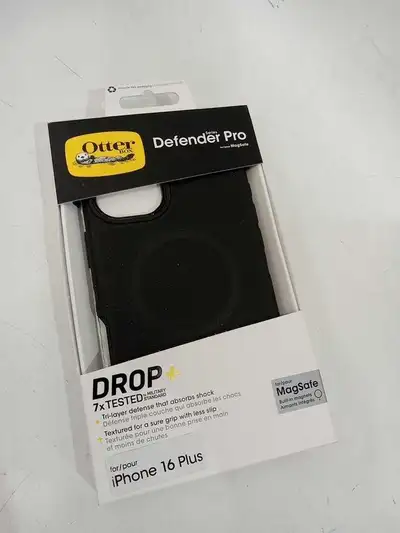 New OtterBox Defender Series Pro case for iPhone 16 Plus is black. This tri-layer protective case ha...