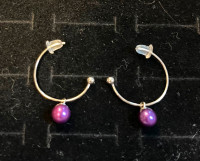 Genuine Akoya Twin Pearl Earrings. Set in sterling silver hoops.