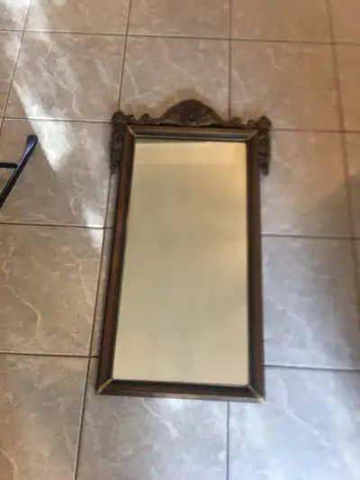 Antique wooden mirror. 29”x17”., View more