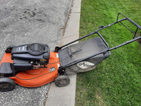 Gas lawnmower Ariens self propelled with grass bag. Good mower