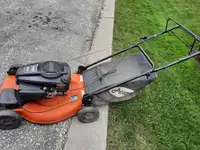Gas lawnmower Ariens self propelled with grass bag. Good mower