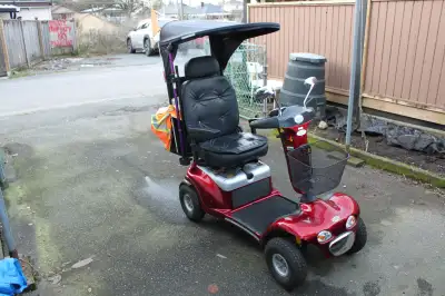 Red scooter in excellent condition. Used for less than a year, only one previous owner, barely drive...