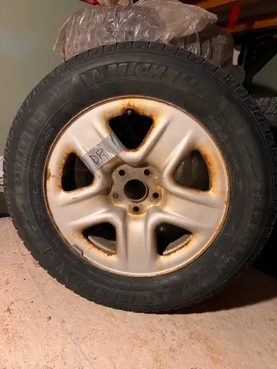 4 Michelin latitude X-Ice tires on rims. Still tread and life left on them. Used on a 3rd generation...