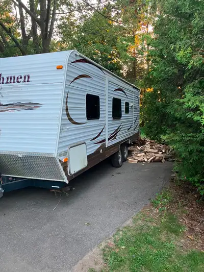 Good condition trailer for sale. Queen bed with memory foam, plus couch and table that convert to be...