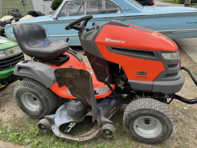 FOR SALE--HUSQVARNA LAWN TRACTOR--23 ho--48 inch cut---$1500--new deck blades---steering rebuilt--ar...