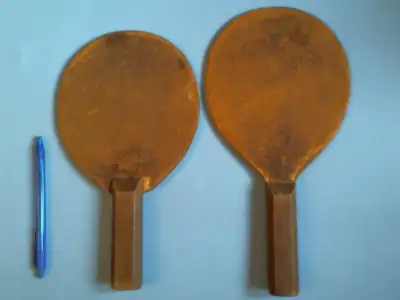 These old boys have great patina. They probably could still be used as playing paddles as they have...