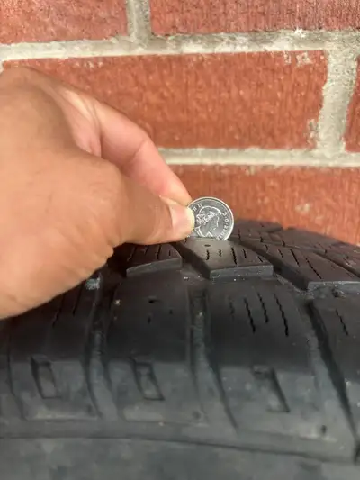 4 winter tires for sale 215 65r16 with steel rim good condition - came off Toyota Sienna 2006