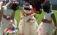  flower girl dress with loose petals at the base