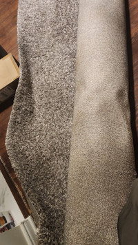 fluffy Rug ( grey colour) slightly used