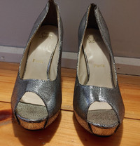 Women's silver high heel shoes, never worn