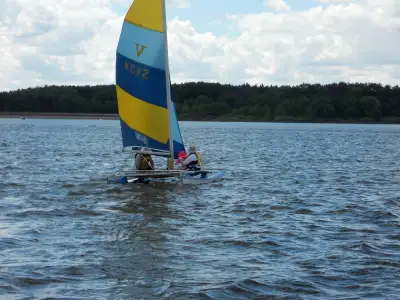 This is a very user friendly catamaran for the family. It is very stable unlike a Hobie catamaran th...