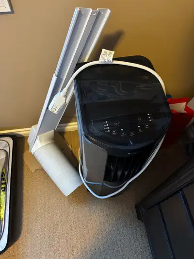 10,200 BTU Portable AC with window install kit, only used for 1 summer and year old in perfect worki...